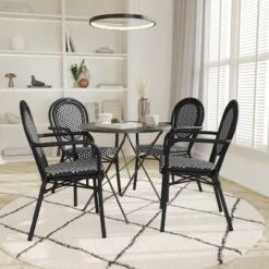 Emma & Oliver Colmar Set Of Four Indoor/Outdoor Stacking Thonet Bistro Style Chairs With Arms, PE Rattan Seat And Finished Metal Frame